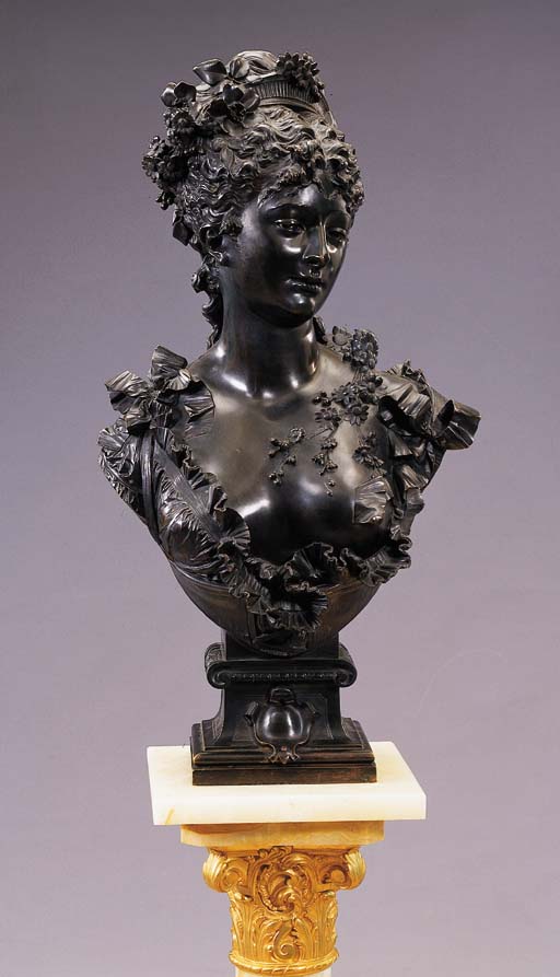 A French bronze portrait of a lady, probably Marguerite Bellanger, on an ormolu-mounted onyx pedestal A French bronze portrait of... 