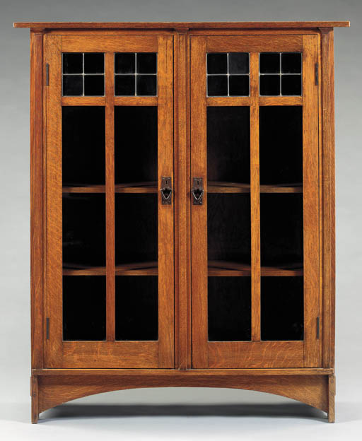 AN OAK TWODOOR BOOKCASE , HARVEY ELLIS FOR GUSTAV STICKLEY, CIRCA 1905