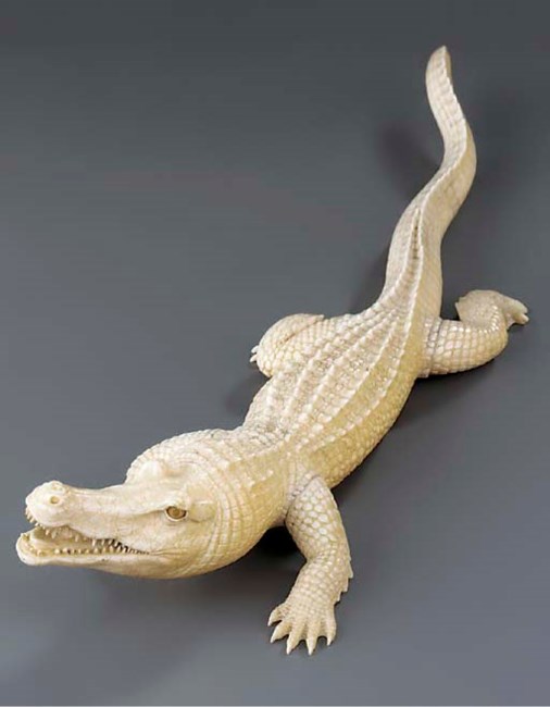 A carved ivory model of a crocodile, late 19th century Christie's