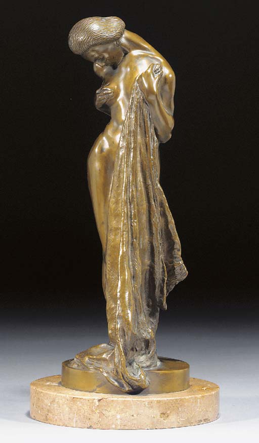 A PATINATED BRONZE FIGURE A PATINATED BRONZE FIGURE 