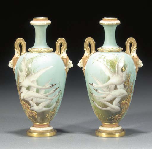 A Pair Of Royal Worcester Duck Egg Blue Two Handled Oviform Vases