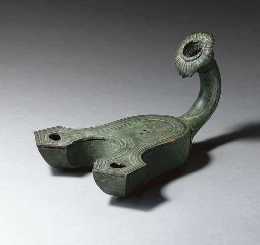 A ROMAN BRONZE OIL LAMP A ROMAN BRONZE OIL LAMP 