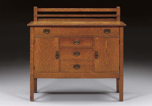 AN OAK SIDEBOARD