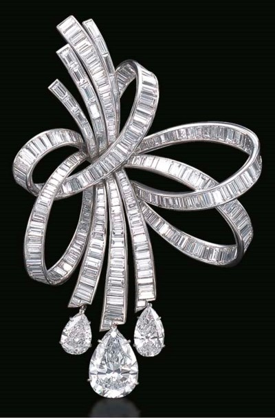 A MAGNIFICENT LIGHT BLUE DIAMOND AND DIAMOND BROOCH, BY HARRY WINSTON