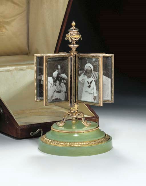 AN IMPERIAL VARI-COLORED SILVER-GILT AND BOWENITE REVOLVING PICTURE FRAME