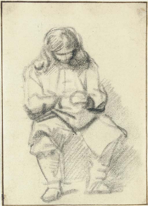 A seated man with long hair, his hands folded 
