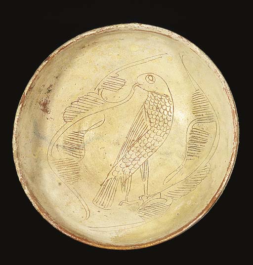 TWO BYZANTINE SGRAFFITO POTTERY BOWLS AND A DISH , 12TH CENTURY A.D