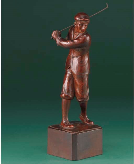 A CARVED WOODEN FIGURE OF A GOLFER Christie's