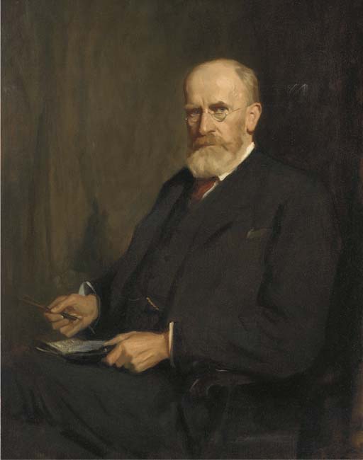 Portrait of Mr Pryor, seated three-quarter-length, in a black suit, holding a notebook and pen
