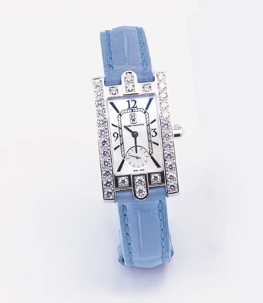 HARRY WINSTON. A LADY'S 18K WHITE GOLD AND DIAMONDSET RECTANGULAR