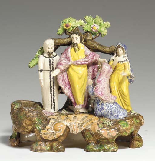A STAFFORDSHIRE PEARLWARE FIGURE GROUP OF 'ABRAHAM OFFERING UP