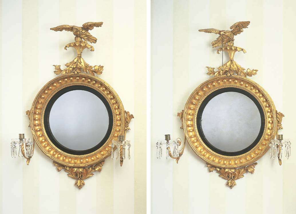 A PAIR OF CLASSICAL GILTWOOD GIRANDOLE MIRRORS
