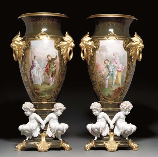 A PAIR OF LIMOGES (HENRI ARDANT & CO.) OLIVEGREEN GROUND THREEHANDLED