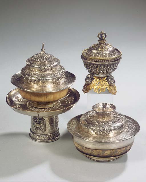 (3) two tibetan silver and wood tea cups and a kapala , LATE 19TH
