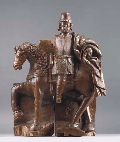 A CARVED WOOD GROUP OF SAINT MARTIN