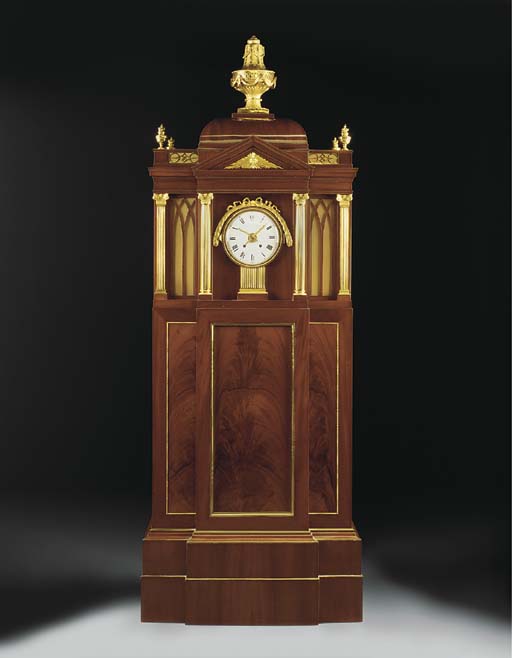A GERMAN ORMOLU AND BRASSMOUNTED MAHOGANY MUSICAL ORGAN CLOCK , THE