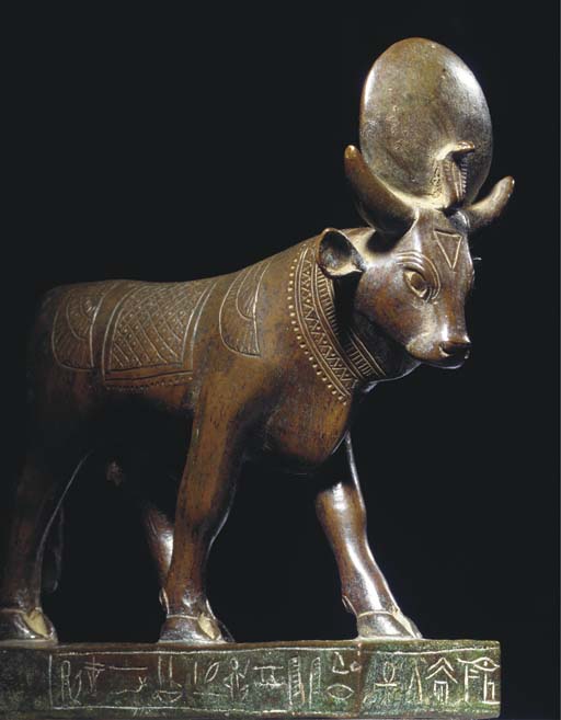 AN EGYPTIAN BRONZE FIGURE OF AN APIS BULL , DYNASTY XXVI (664525 B.C