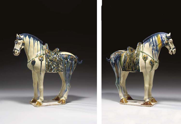 A VERY RARE BLUE AND SANCAIGLAZED POTTERY FIGURE OF A FERGHANA HORSE