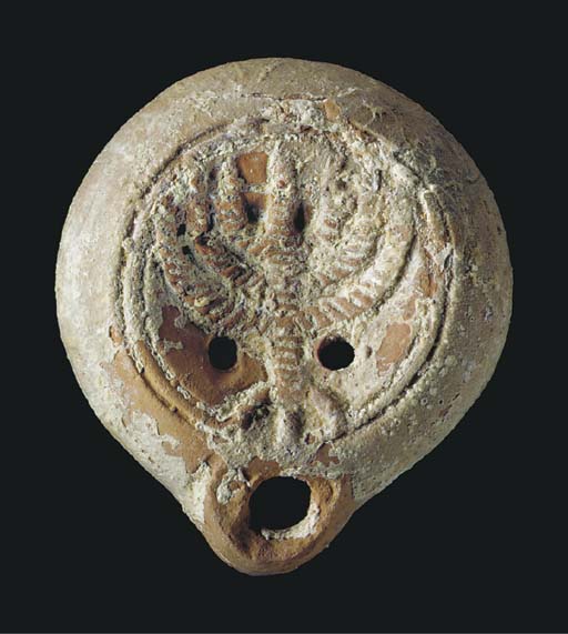 AN EARLY JEWISH TERRACOTTA OIL LAMP , ROMAN PERIOD, CIRCA 1ST CENTURY A