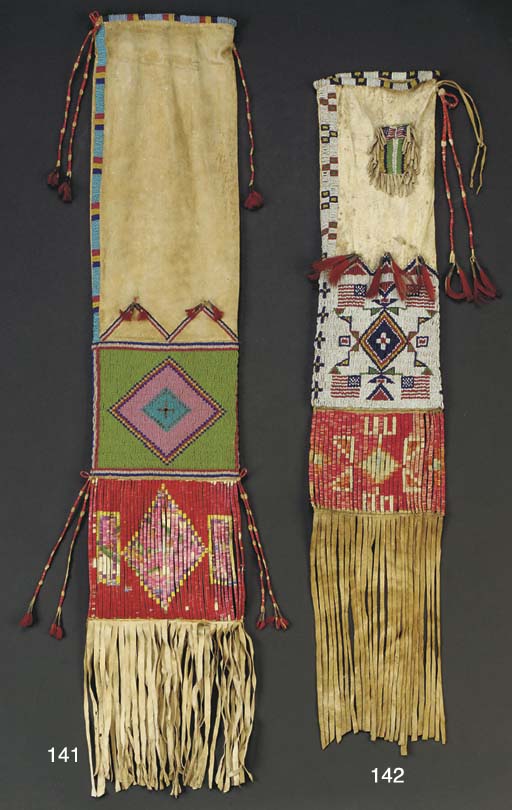 A KIOWA BEADED HIDE MODEL CRADLEBOARD