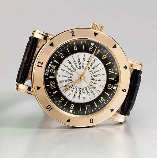 WALDEN. AN 18K PINK GOLD AUTOMATIC WORLD TIME WRISTWATCH , SIGNED