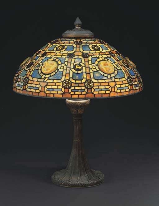 Tiffany Studios , A 'ZODIAC' LEADED GLASS, TURTLEBACK TILE AND BRONZE