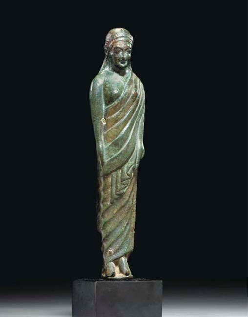 AN ETRUSCAN BRONZE DRAPED WOMAN , CIRCA 500 B.C. | Christie's