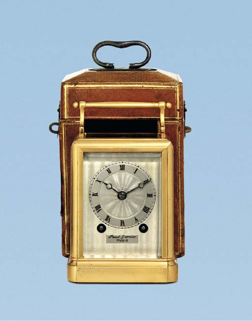 A French gilt-brass small one-piece striking carriage clock with