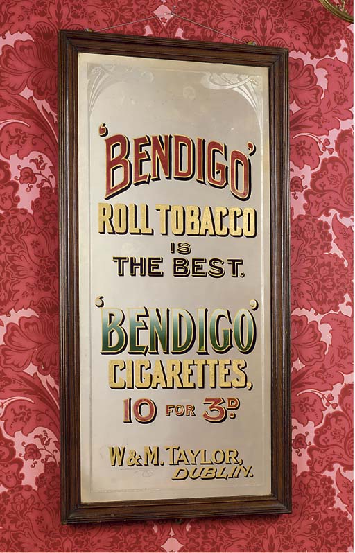 AN IRISH ADVERTISING MIRROR , EARLY 20TH CENTURY