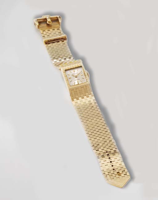 Rolex. A ladies unusual 18K gold square bracelet watch , SIGNED ROLEX