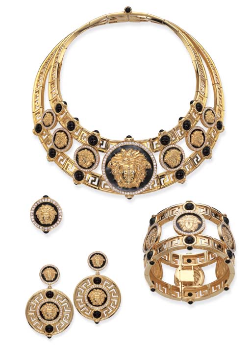 A SUITE OF GOLD, ONYX, ENAMEL AND DIAMOND JEWELLERY, BY VERSACE