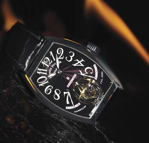FRANCK MULLER. A VERY EXCEPTIONAL PLATINUM TONNEAU-SHAPED DUAL A
