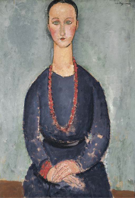 Donna con collana rossa 
