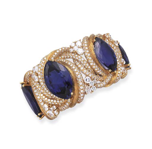 A TANZANITE AND DIAMOND BRACELET, BY HENRY DUNAY