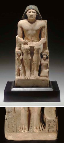 AN EGYPTIAN LIMESTONE GROUP ST