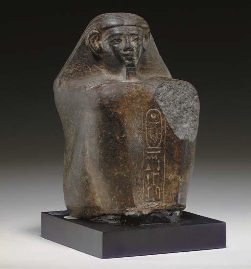 AN EGYPTIAN BASALT BLOCK STATUE FOR IPI , MIDDLE KINGDOM, DYNASTY XII