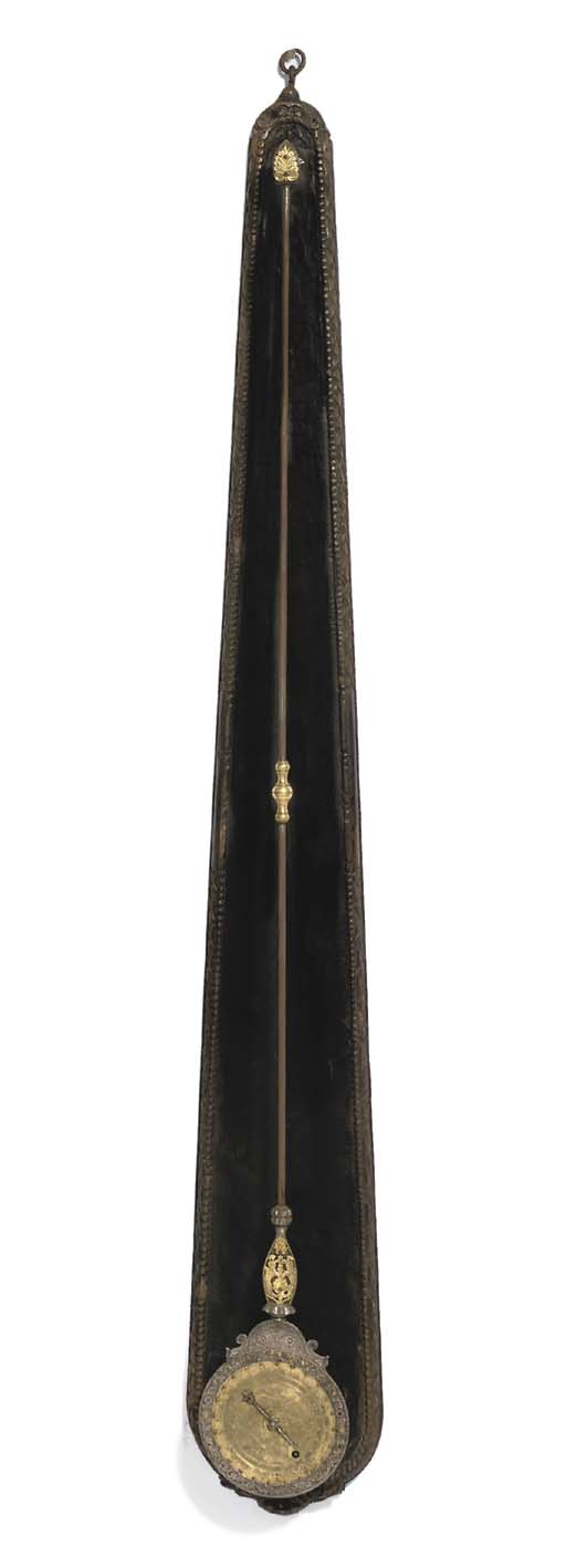 A Continental Ebonised Wood Engraved Steel And Brass Swinging Wall Timepiece