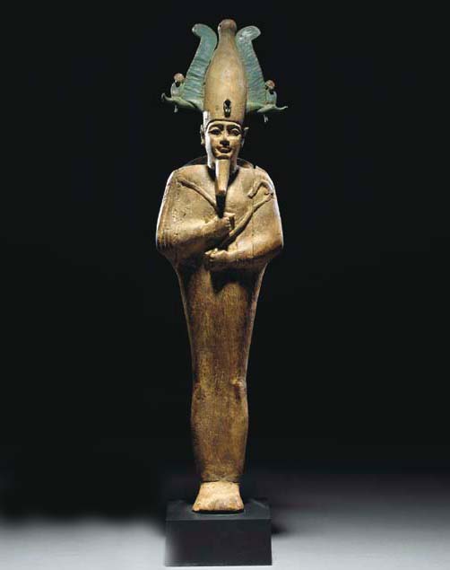 A LARGE EGYPTIAN CEDAR WOOD CULT STATUE OF OSIRIS , CIRCA 4TH2ND
