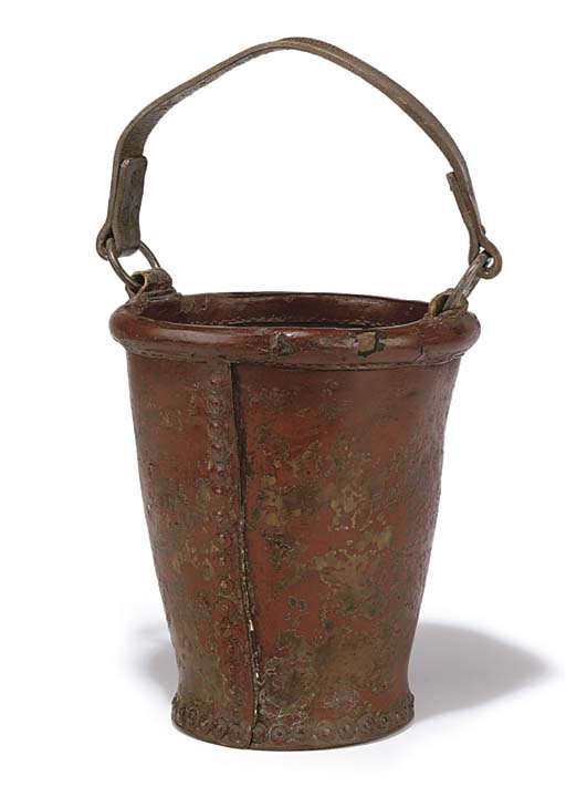 A RED PAINTED LEATHER FIRE BUCKET , 19TH CENTURY Christie's