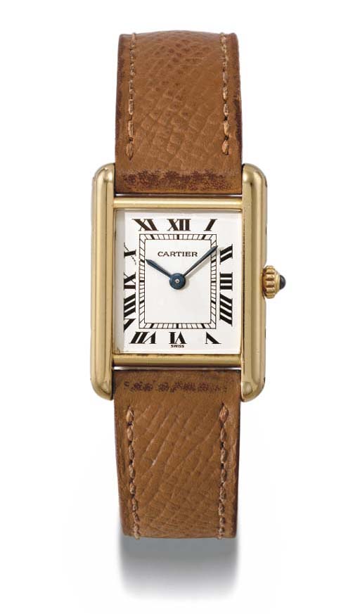 Cartier. An 18K gold rectangular wristwatch , SIGNED CARTIER, TANK