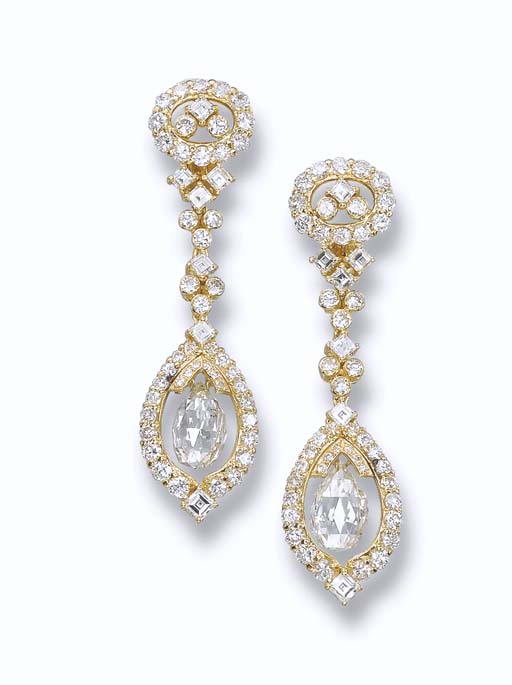 AN ELEGANT PAIR OF DIAMOND EAR PENDANTS, BY O.J. PERRIN