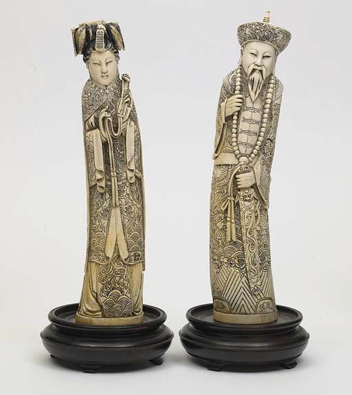 **A PAIR OF CHINESE IVORY CARVINGS OF AN EMPEROR AND EMPRESS Christie's