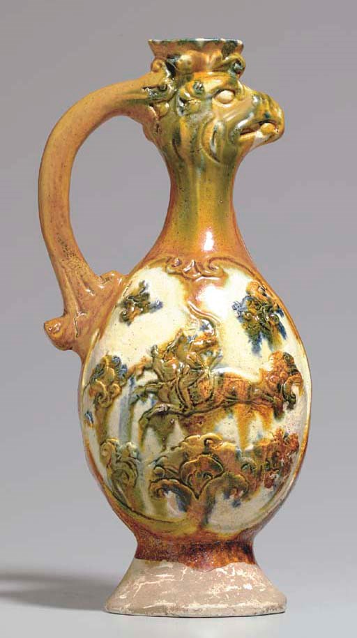 A BLUE AND SANCAIGLAZED POTTERY PHOENIXHEAD EWER , TANG DYNASTY (618
