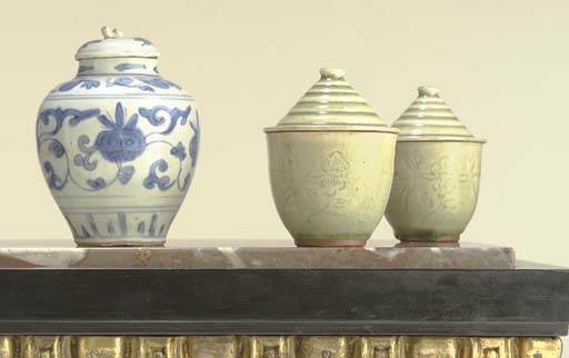 A PAIR OF CHINESE WHITE-GLAZED INCIZED OVOID VASES , SIX