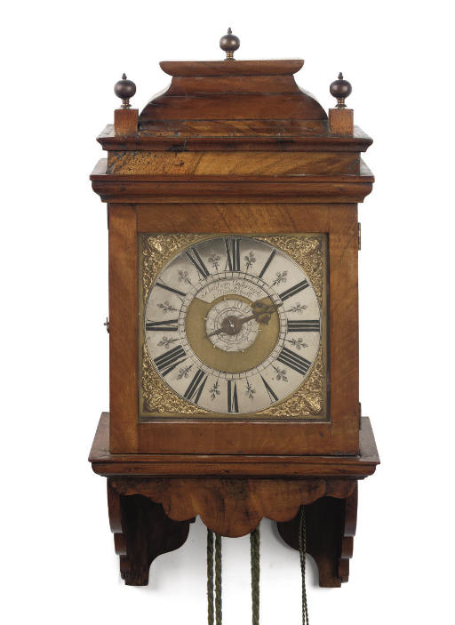 A DUTCH PROVINCIAL WALNUT STRIKING WALL CLOCK (HOOD CLOCK) WITH ALARM
