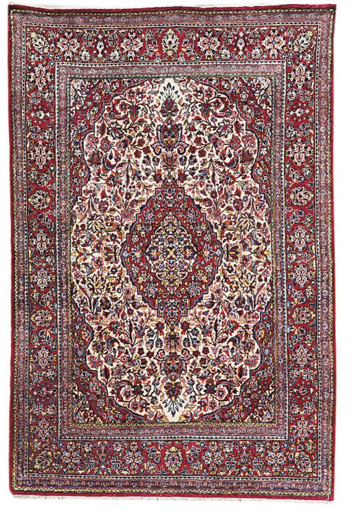 A SILK KASHAN RUG