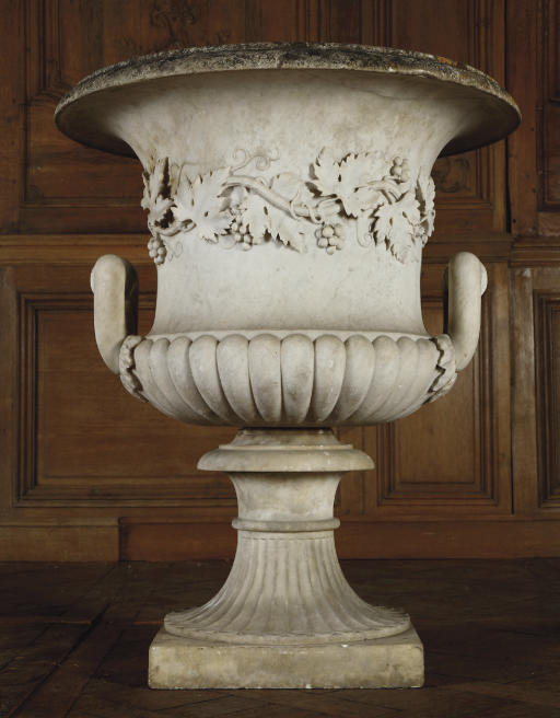 A CARVED MARBLE VASE