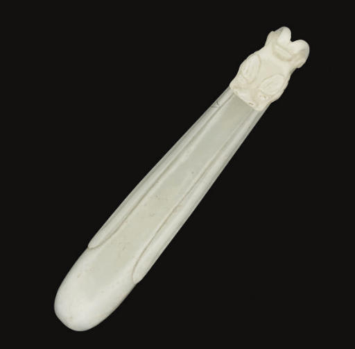 A Chinese white jade belt hook, 19th century Christie's