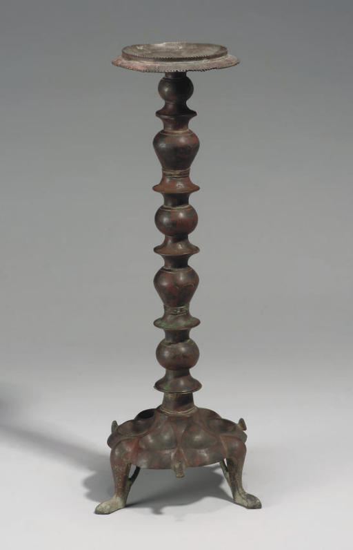 A KHORASAN BRONZE LAMP STAND, IRAN, 12TH CENTURY Christie's