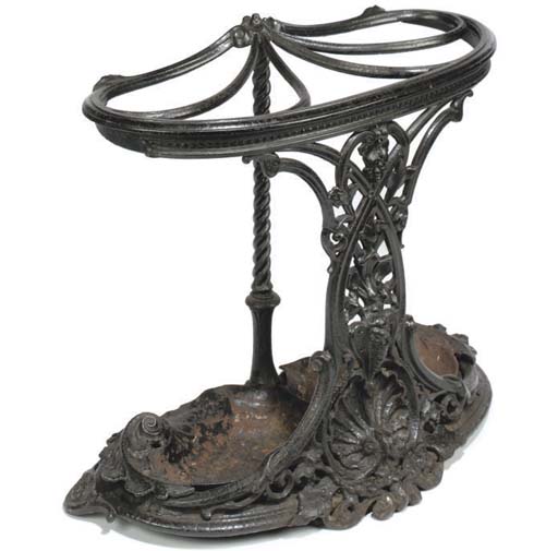 A COALBROOKDALE BLACK PAINTED CAST IRON STICK/UMBRELLA STAND